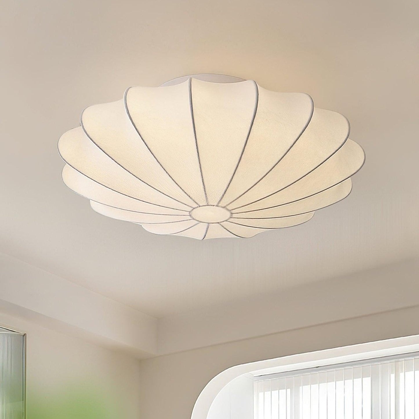 Plafonnier design minimaliste forme coquillage blanc