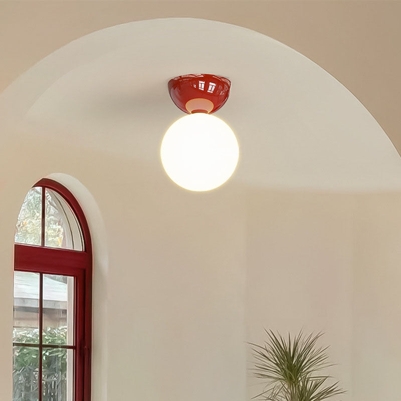 Suspension boule verre rouge design scandinave moderne