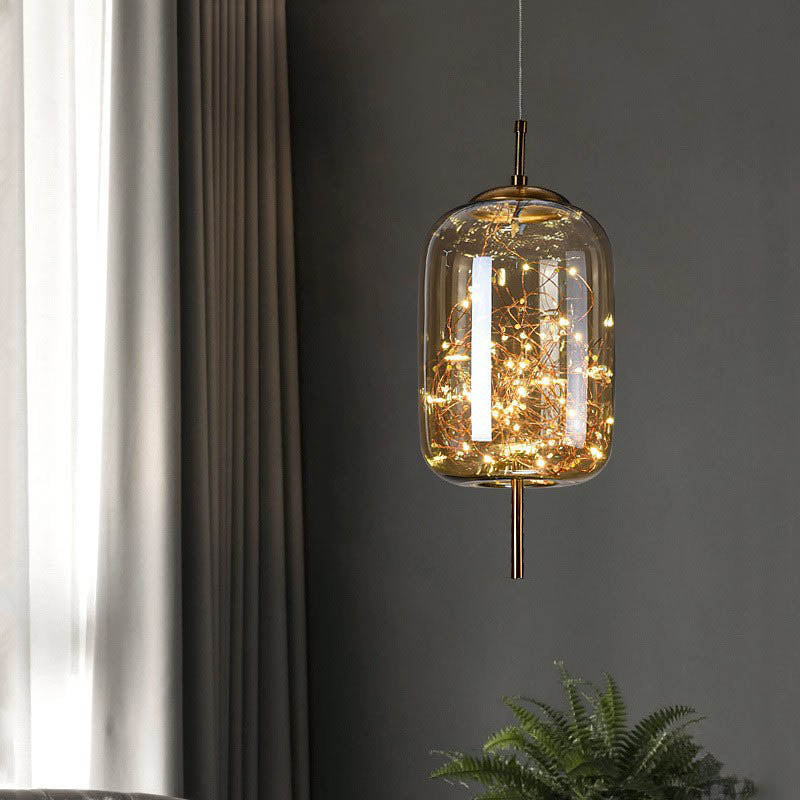Suspension design verre et LED dorée moderne