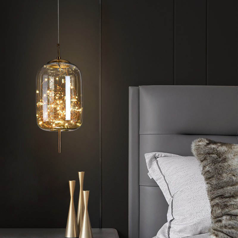 Suspension design verre et LED dorée moderne