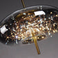 Suspension design verre et LED dorée moderne