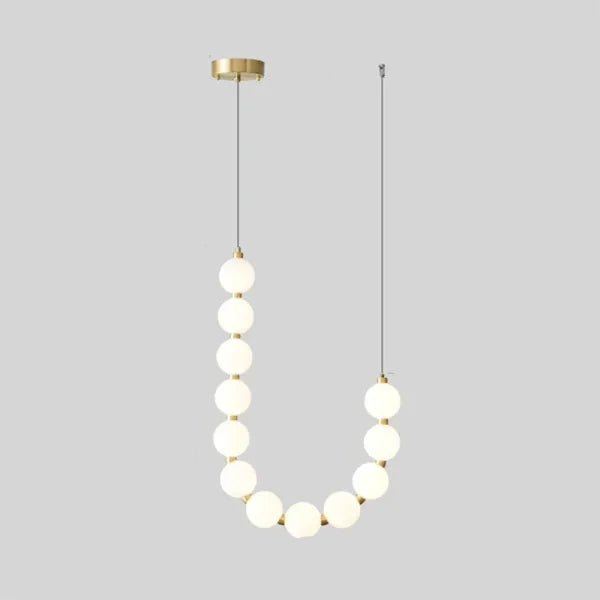 Suspension design luxe à globes lumineux dorés