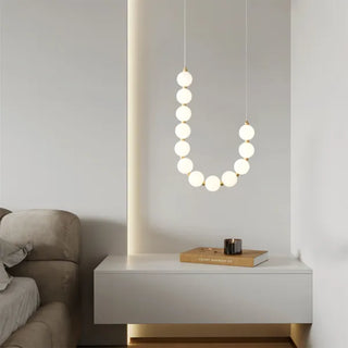 Suspension design luxe à globes lumineux dorés
