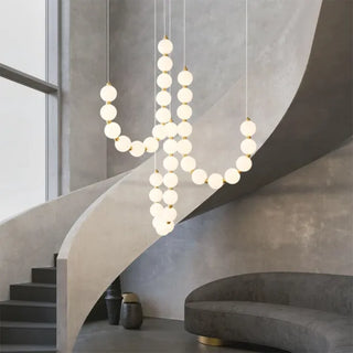 Suspension design luxe à globes lumineux dorés