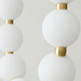 Suspension design luxe à globes lumineux dorés
