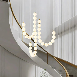 Suspension design luxe à globes lumineux dorés