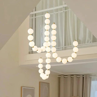 Suspension design luxe à globes lumineux dorés