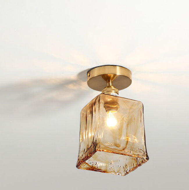 Suspension japonaise verre ambré et métal doré design