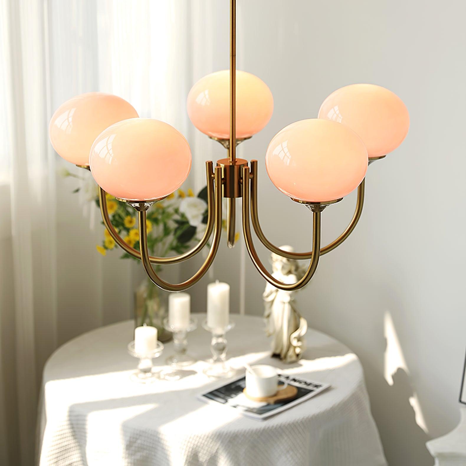 Suspension design dorée globes en verre rose