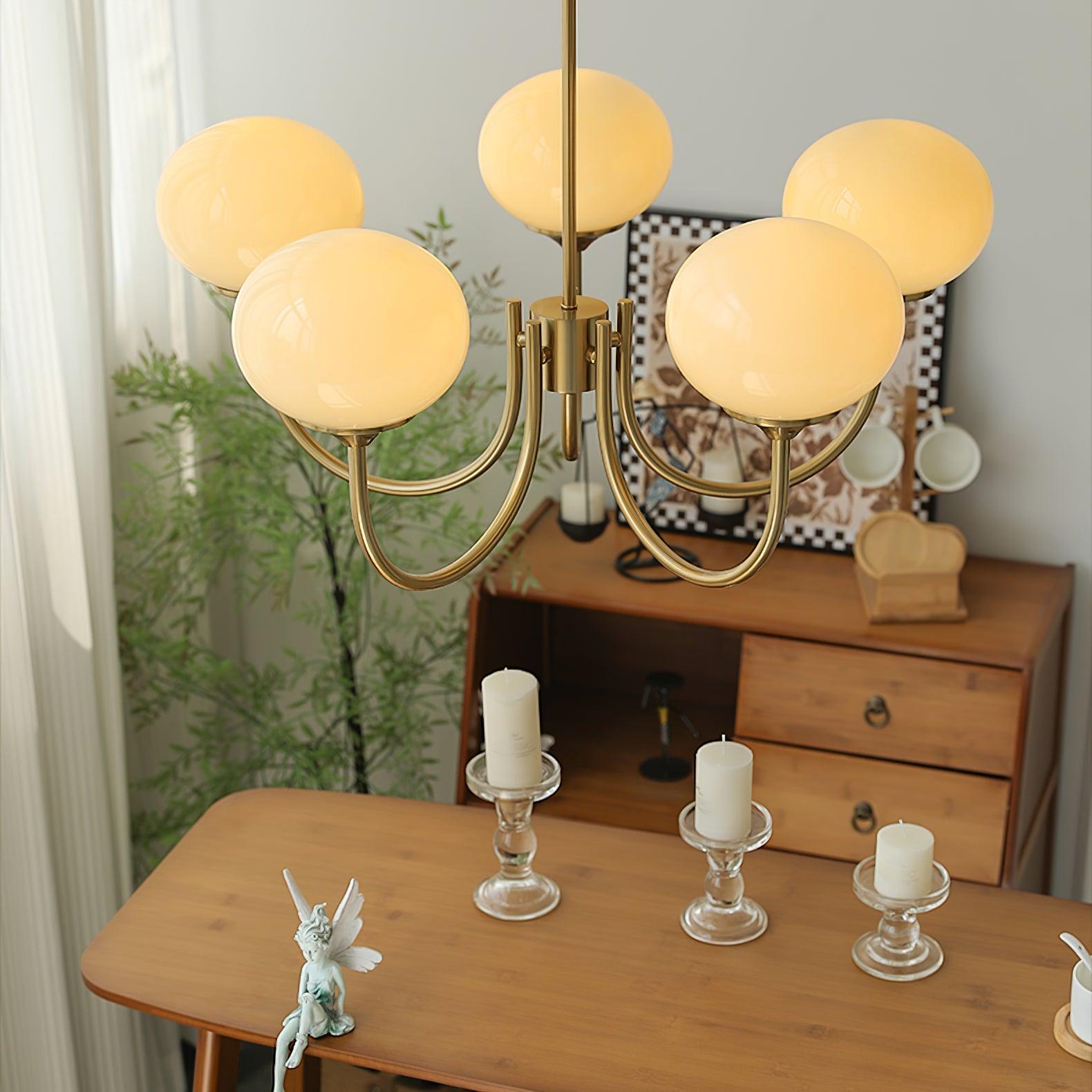 Suspension design dorée globes en verre rose