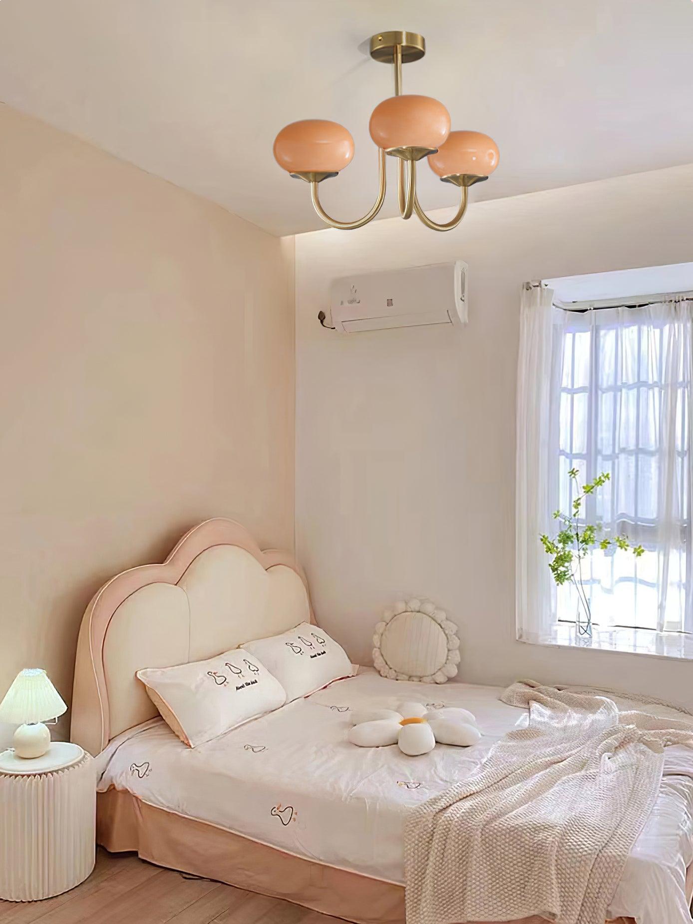 Suspension design dorée globes en verre rose