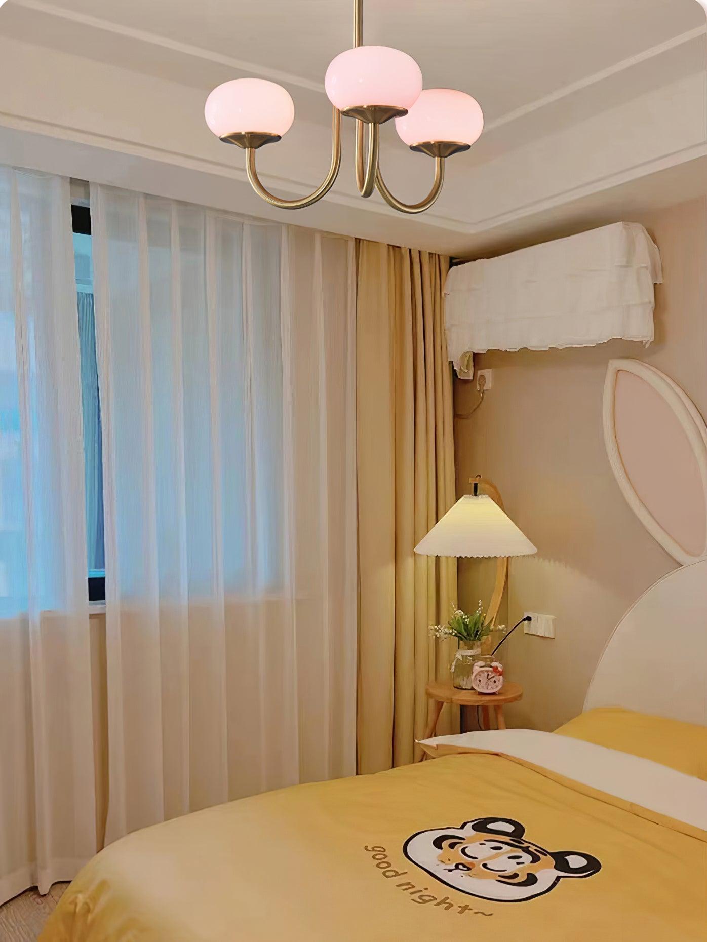 Suspension design dorée globes en verre rose