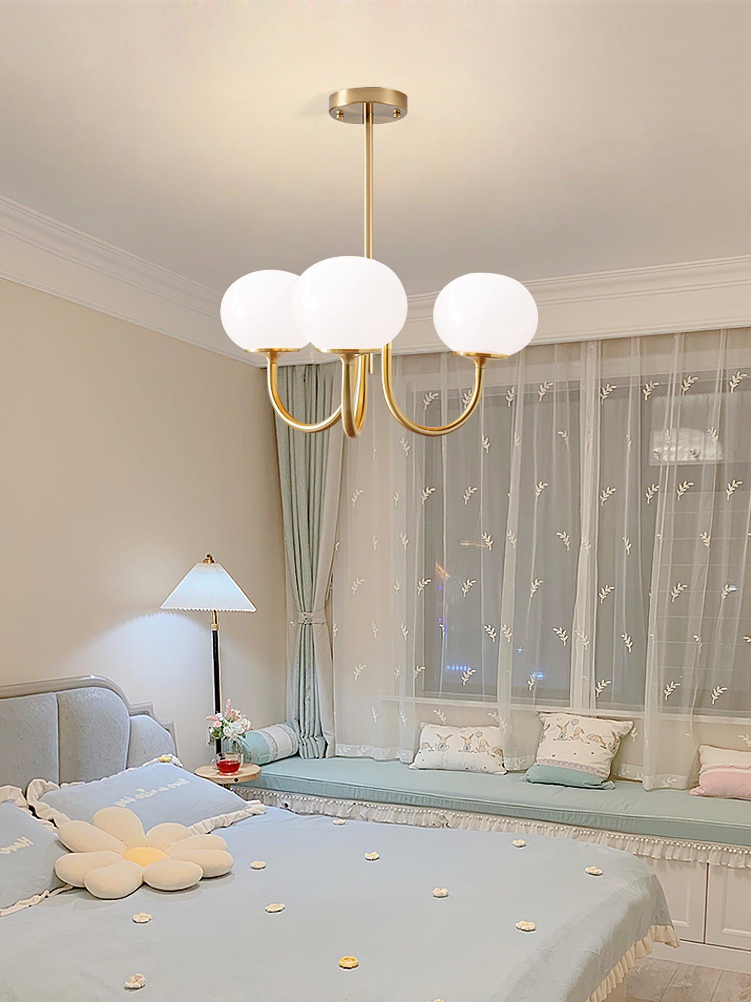 Suspension design dorée globes en verre rose