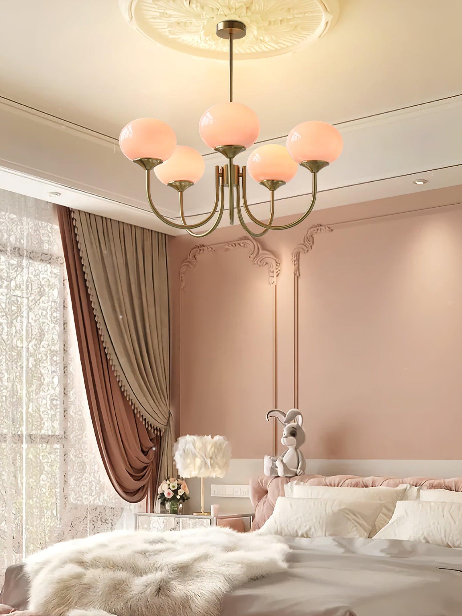 Suspension design dorée globes en verre rose