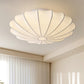 Plafonnier design minimaliste forme coquillage blanc
