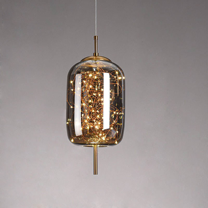 Suspension design verre et LED dorée moderne