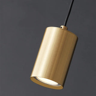 Suspension design minimaliste en métal doré