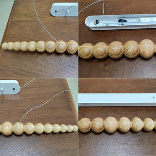 Suspension linéaire en perles de bois design moderne