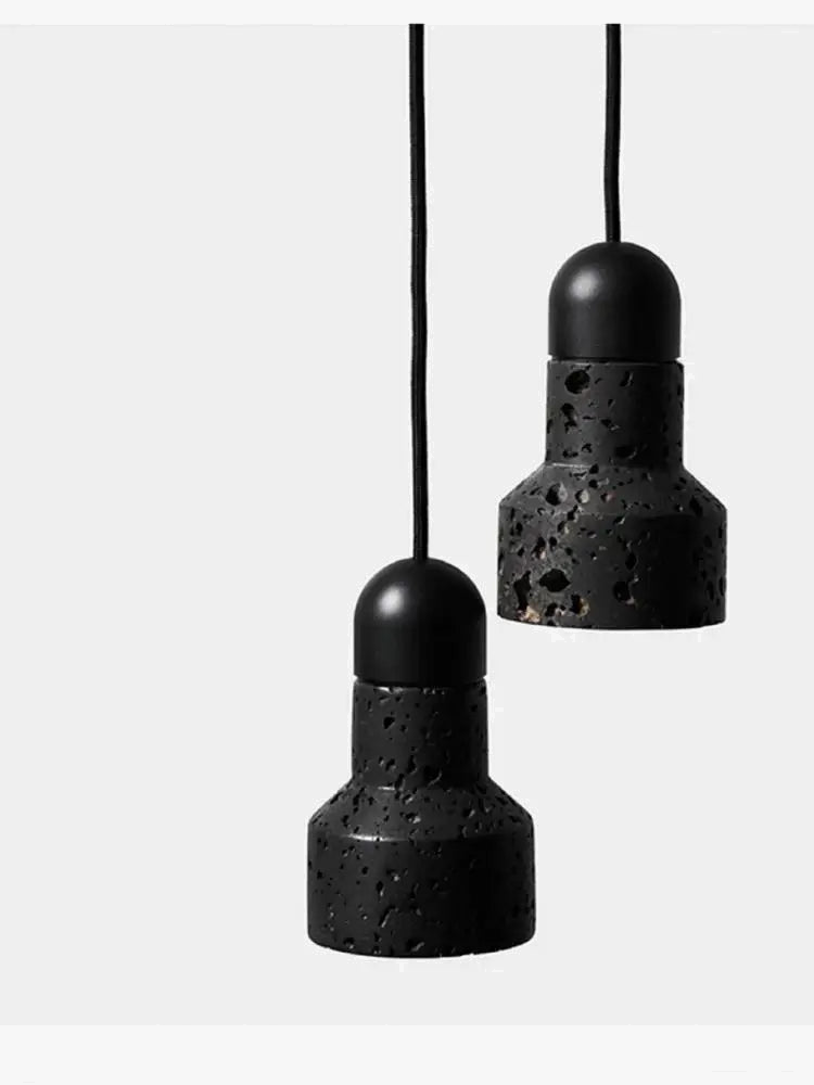 Suspension design minimaliste en pierre volcanique noire