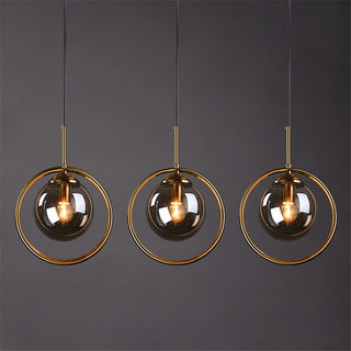 Suspension design boule en verre avec anneau dorée
