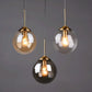 Suspension design boule en verre minimaliste