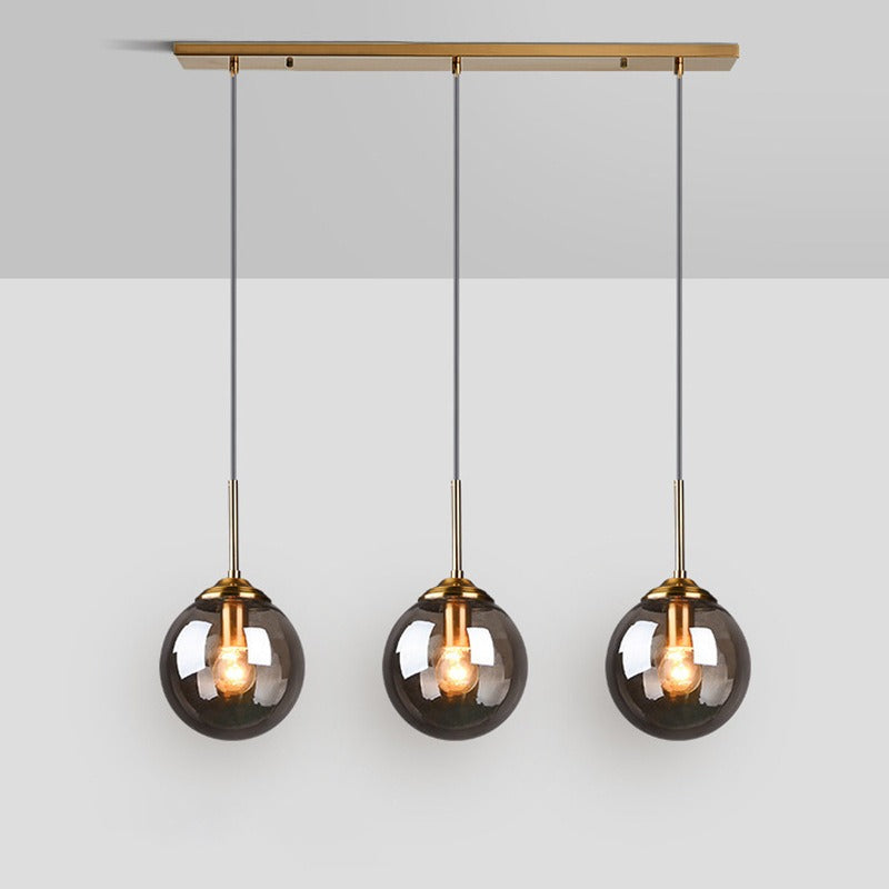 Suspension design boule en verre minimaliste